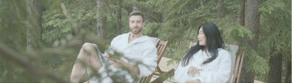 Couple relaxing together outdoors